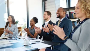 Business professionals applauding
