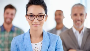 Smiling professionals in a corporate office